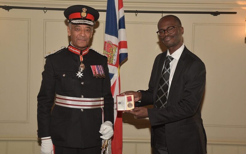 Matthew McKenzie receiving his British Empire Medal